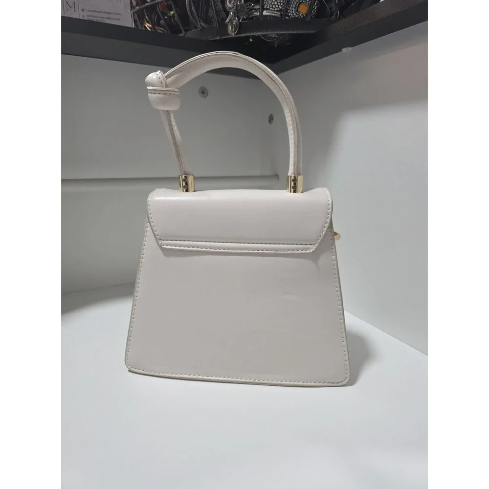 White Structured Top Handle Purse Gold Embroidered Abstract Face Chain Strap Bag